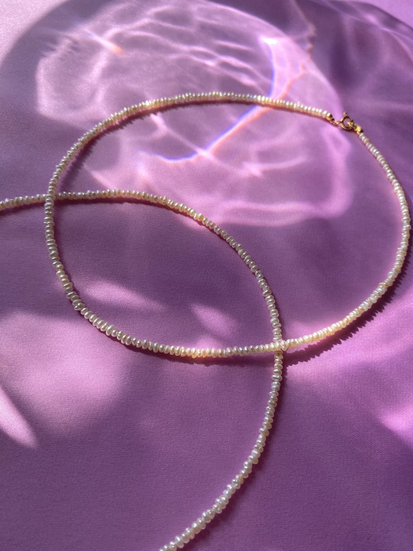 Pinprick pearl necklace