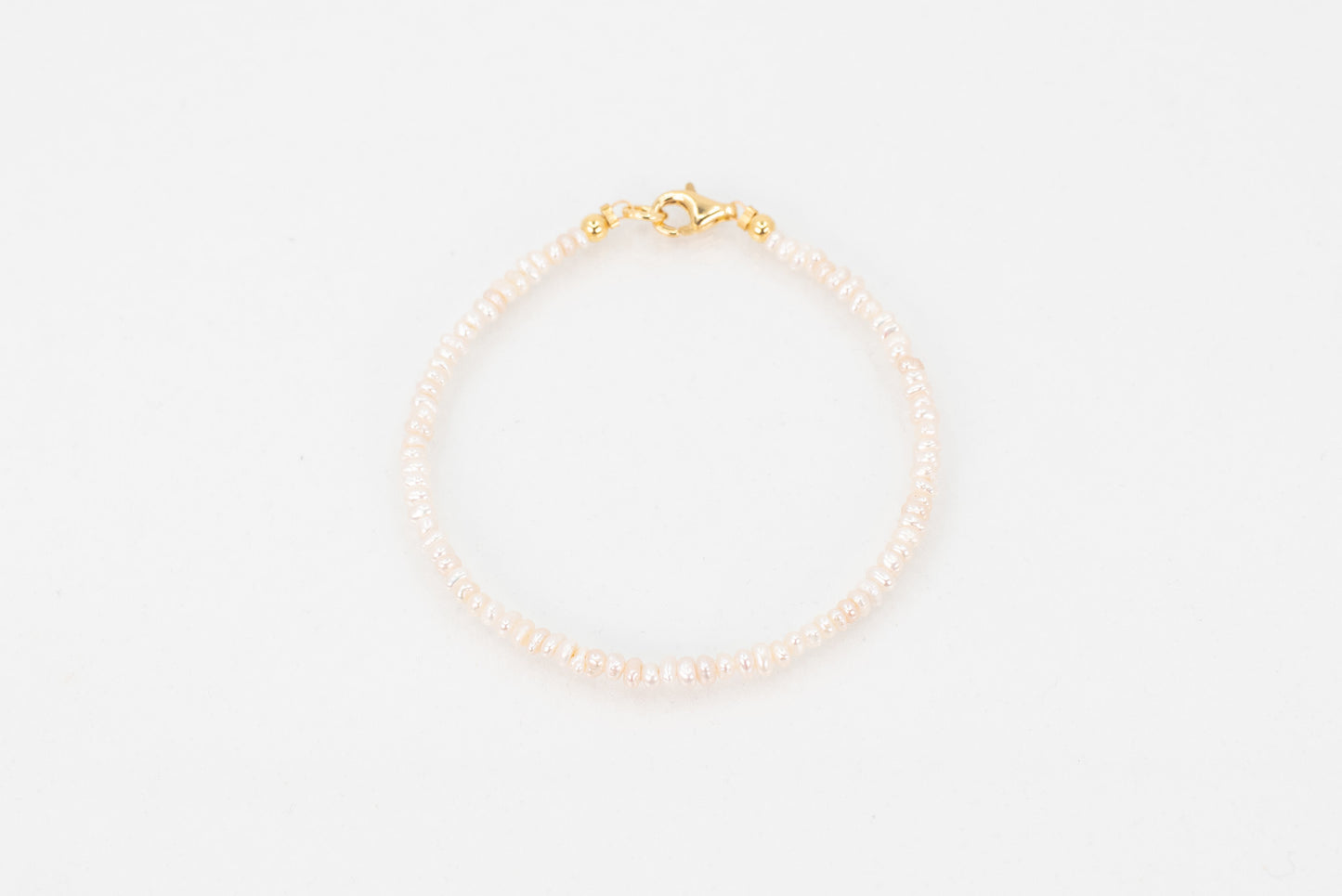 Pinprick pearl bracelet